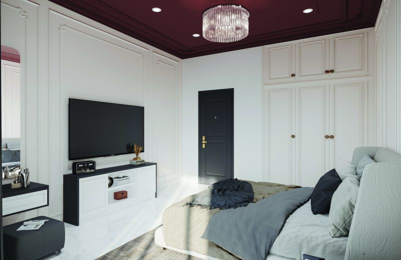 Bedroom with a white floor-to-ceiling wardrobe and a TV unit in a 2 BHK home in Chandapura, designed by Huma Interiors