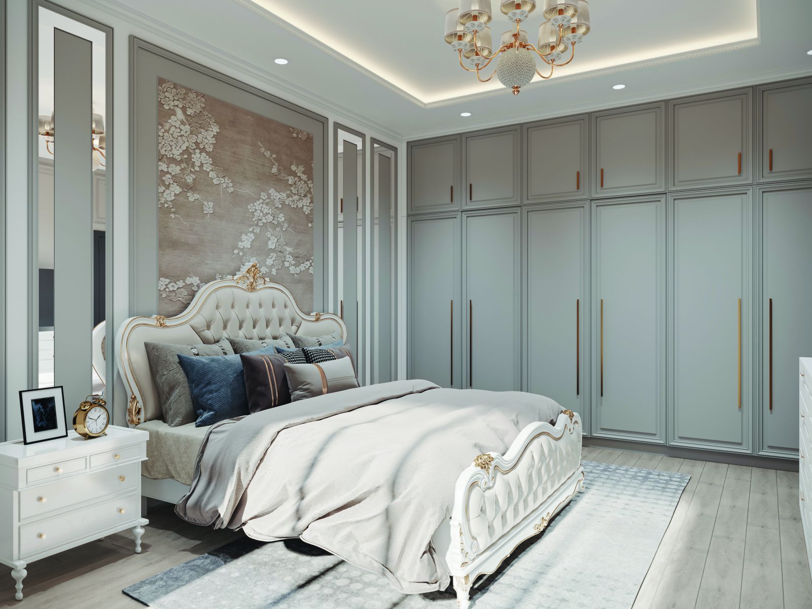 Bedroom with a full-height grey wardrobe and a classic headboard in a 2 BHK home in Chandapura, designed by Huma Interiors