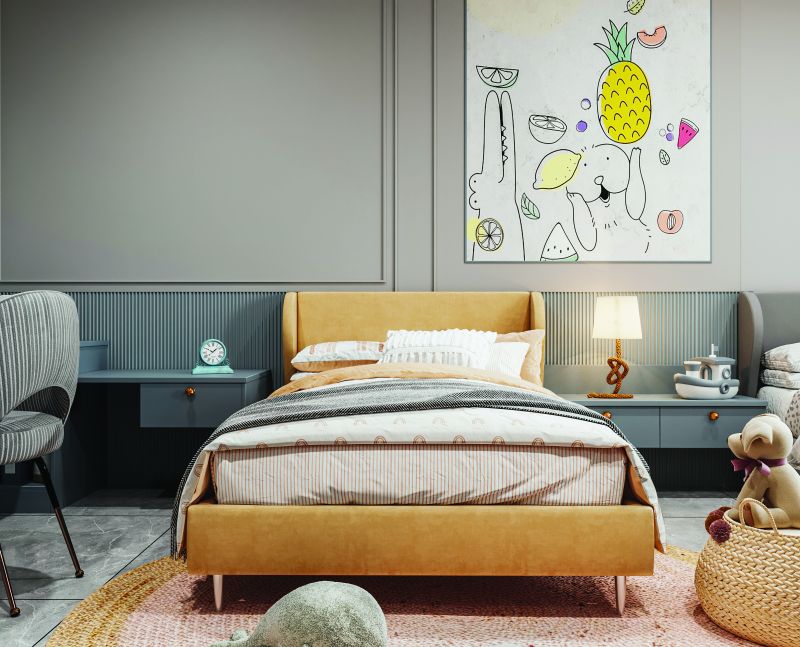 Children’s bedroom with a mustard upholstered bed in a 3 BHK home in Varthur, designed by Huma Interiors