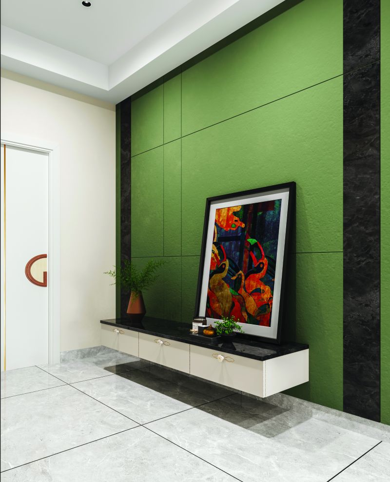 Entrance lobby with a green fluted wall panel and a console in a 3 BHK home in Varthur, designed by Huma Interiors