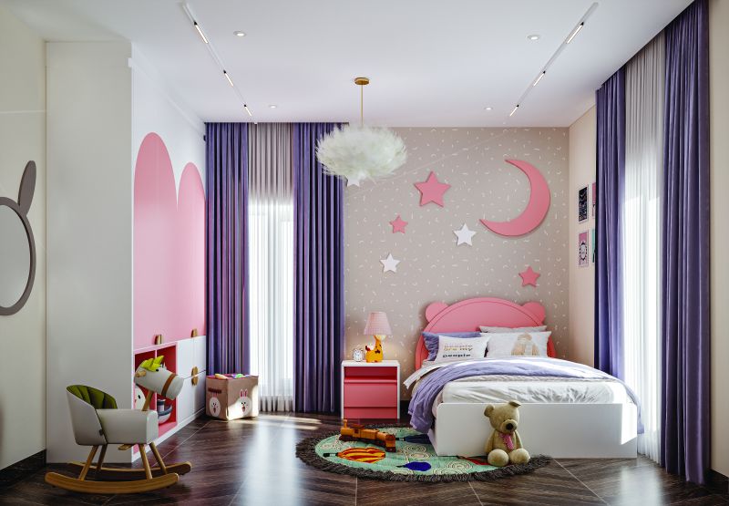 Children’s room with a pink arch wall and purple curtains in a 3 BHK home in Jigani, designed by Huma Interiors