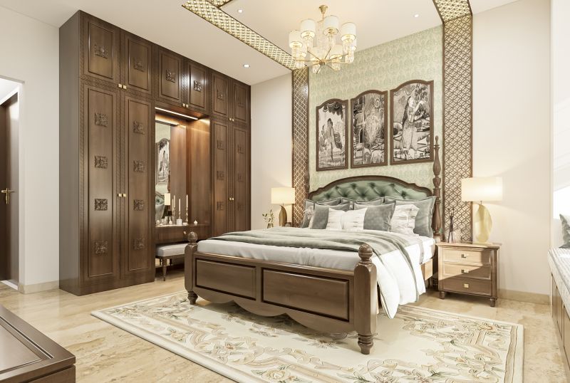 Traditional bedroom with a carved wooden wardrobe in a villa on Sarjapur Road, designed by Huma Interiors