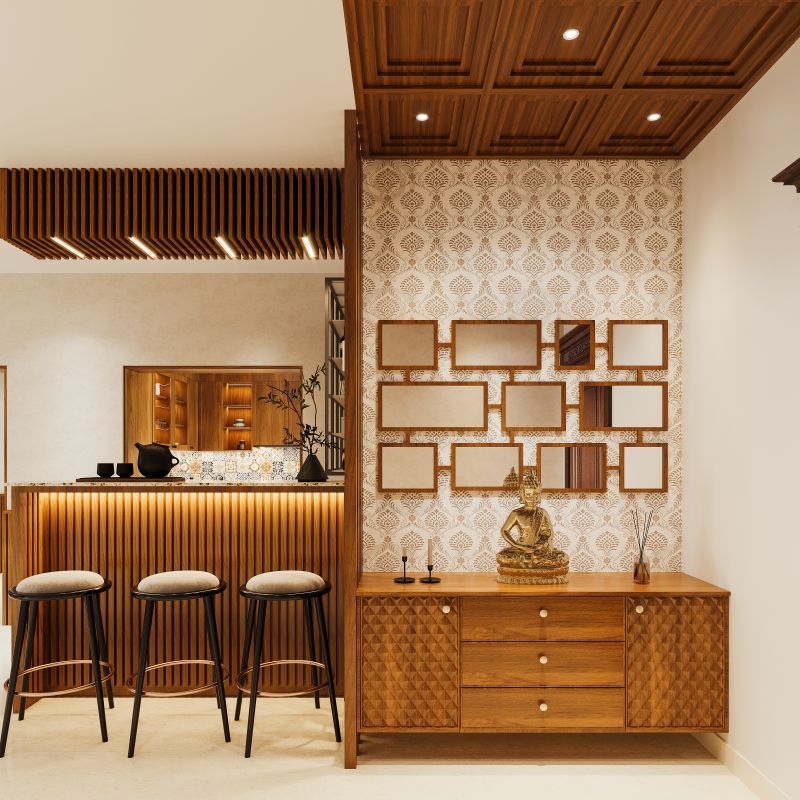 Foyer with a carved wooden console and display unit in a traditional villa on Sarjapur Road, designed by Huma Interiors